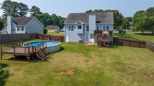 630 River Mill Rd, Bethlehem, GA 30620 - rear view of house featuring a wooden deck and a chimney