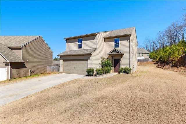 view of front facade with a garage, concrete driveway, and fence