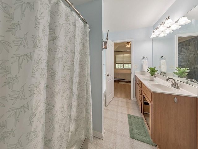 388 Oakhaven Way, Villa Rica, GA 30180 - ensuite bathroom featuring a ceiling fan, tile patterned floors, vanity, and connected bathroom
