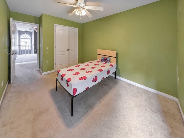 388 Oakhaven Way, Villa Rica, GA 30180 - carpeted bedroom featuring baseboards, a closet, and a ceiling fan