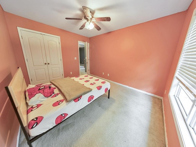388 Oakhaven Way, Villa Rica, GA 30180 - bedroom with a ceiling fan, carpet floors, baseboards, and a closet