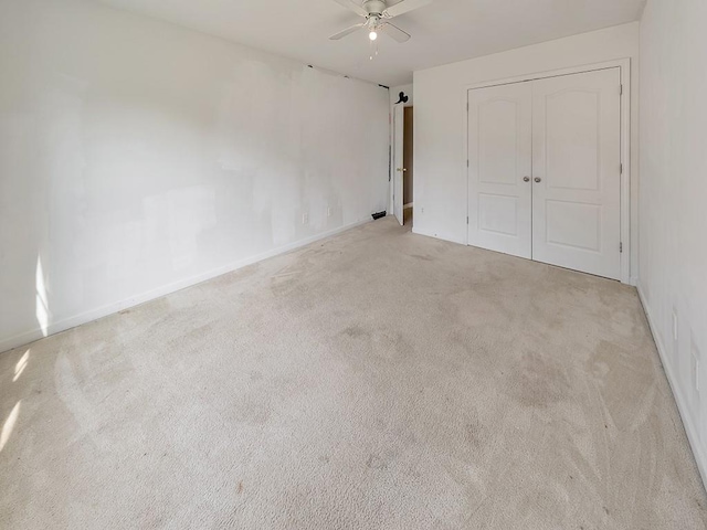 388 Oakhaven Way, Villa Rica, GA 30180 - unfurnished bedroom with a closet, ceiling fan, and carpet