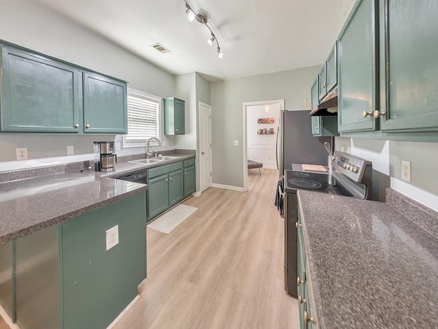 388 Oakhaven Way, Villa Rica, GA 30180 - kitchen with light wood-type flooring, a sink, visible vents, green cabinetry, and range with electric cooktop