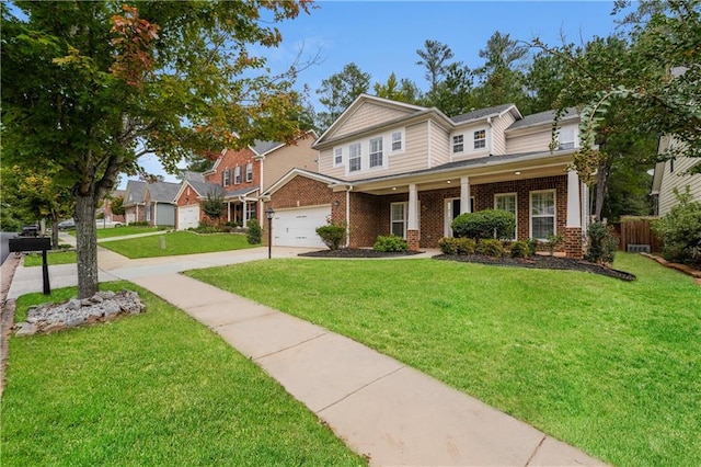 craftsman house featuring a garage and a front yard