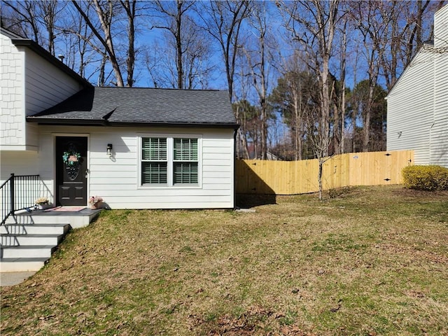 view of yard featuring a gate and fence