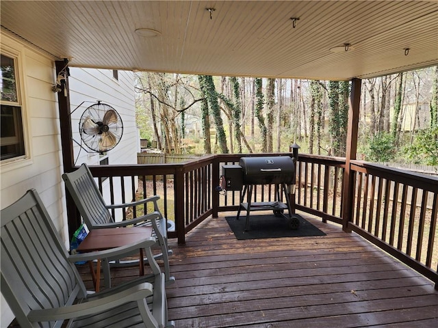 wooden deck with grilling area