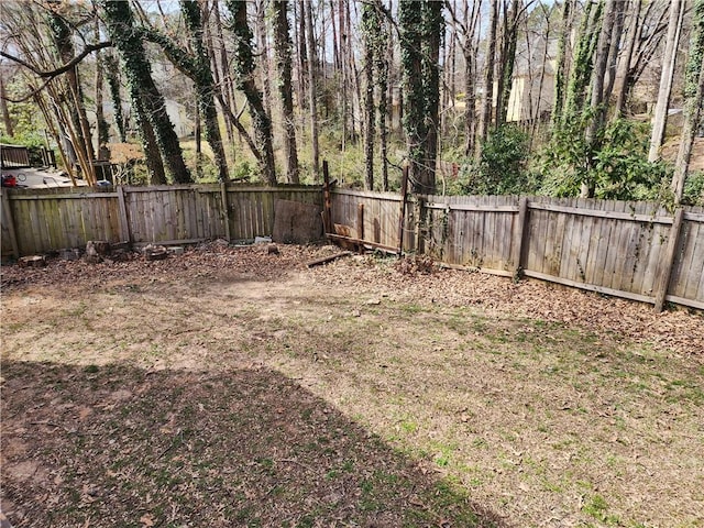 view of yard featuring a fenced backyard