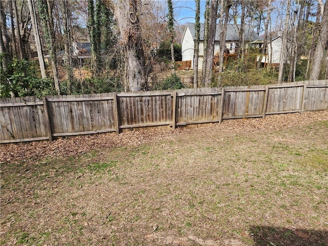 view of yard featuring a fenced backyard