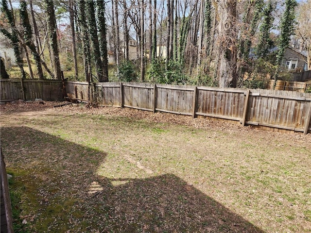 view of yard featuring a fenced backyard