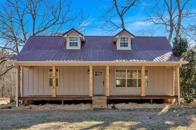 view of front of property featuring covered porch and metal roof