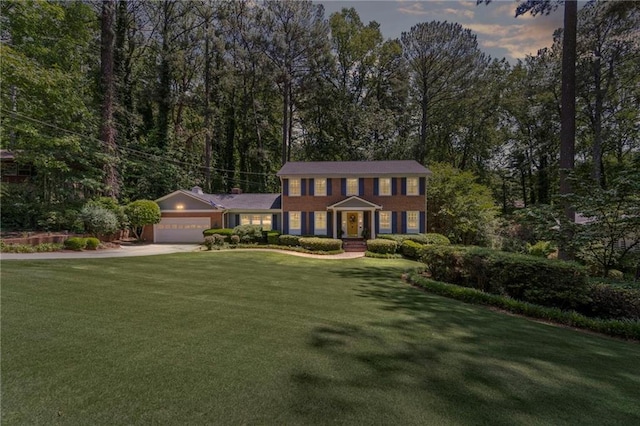 3287 Alton Rd, Atlanta, GA 30341 - colonial-style house with a garage, driveway, and a front yard