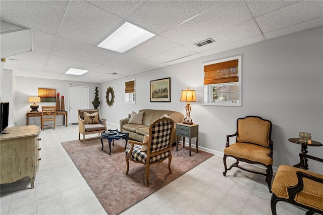 3287 Alton Rd, Atlanta, GA 30341 - living area featuring a drop ceiling and light flooring