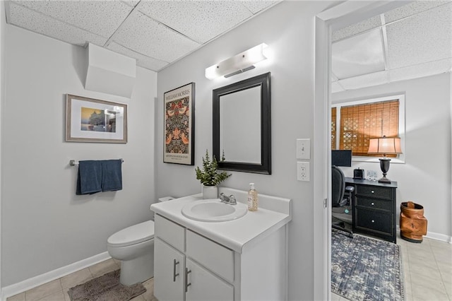 3287 Alton Rd, Atlanta, GA 30341 - bathroom featuring a drop ceiling, tile patterned flooring, baseboards, vanity, and toilet