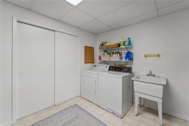3287 Alton Rd, Atlanta, GA 30341 - laundry area with washer and dryer and light tile patterned floors