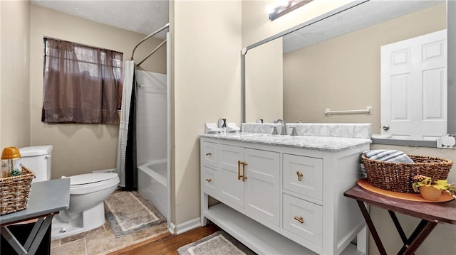 full bathroom with vanity, toilet, hardwood / wood-style floors, and shower / bath combo