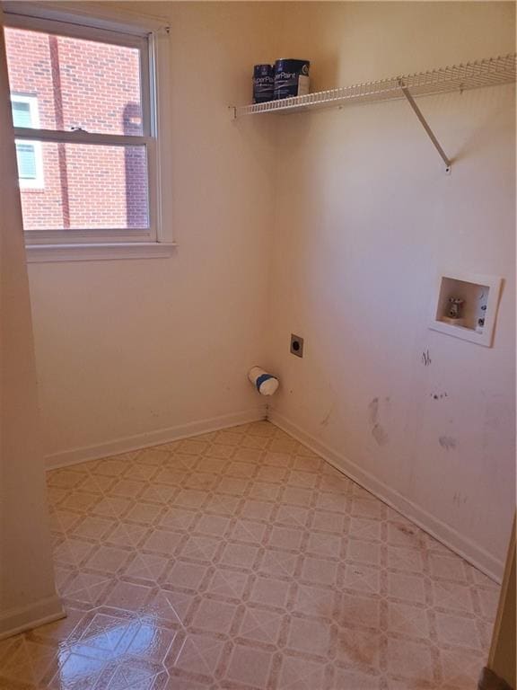 laundry area with washer hookup and electric dryer hookup