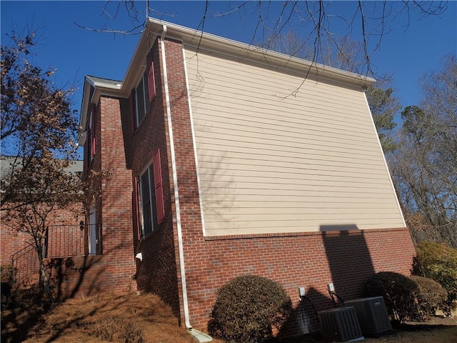 view of side of home with cooling unit