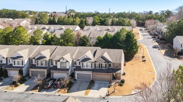 birds eye view of property with a residential view