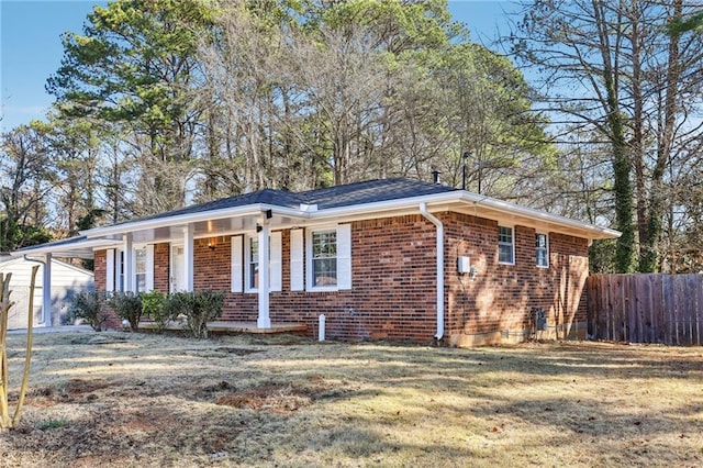 ranch-style house with a front yard