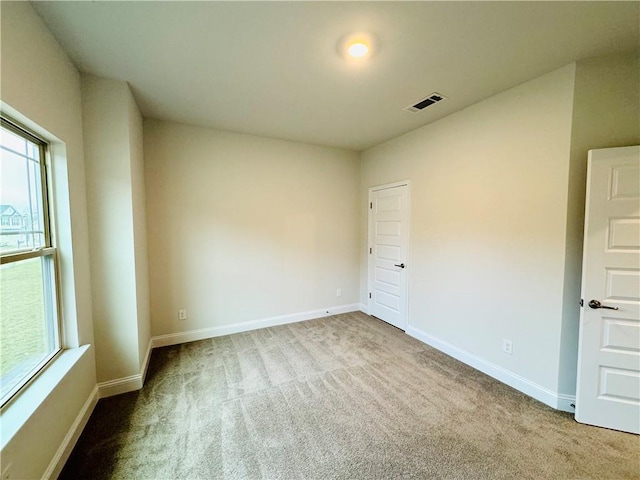 empty room with carpet floors