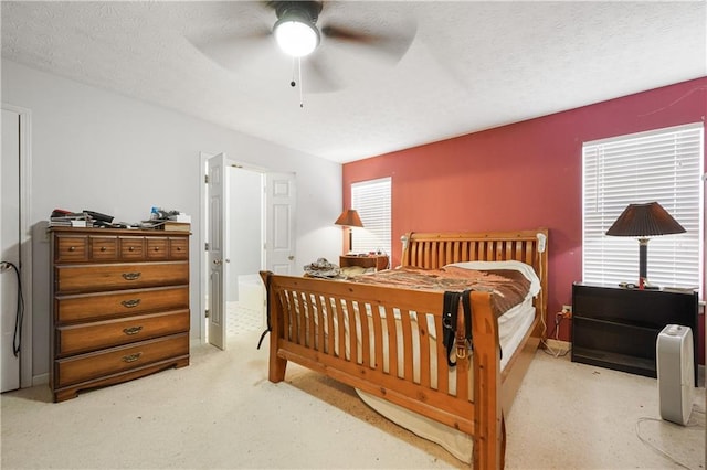 3620 Darwin Pl, Duluth, GA 30096 - bedroom featuring a ceiling fan, a textured ceiling, and light carpet