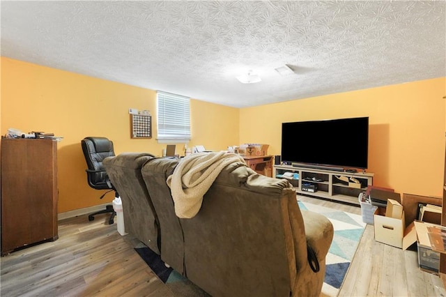 3620 Darwin Pl, Duluth, GA 30096 - living room with wood finished floors and a textured ceiling