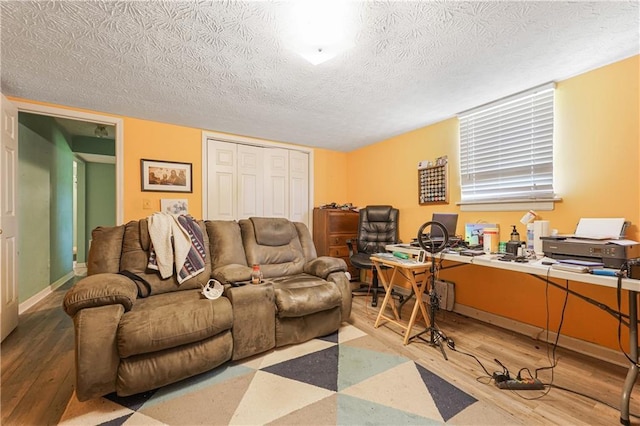 3620 Darwin Pl, Duluth, GA 30096 - home office with wood finished floors and a textured ceiling