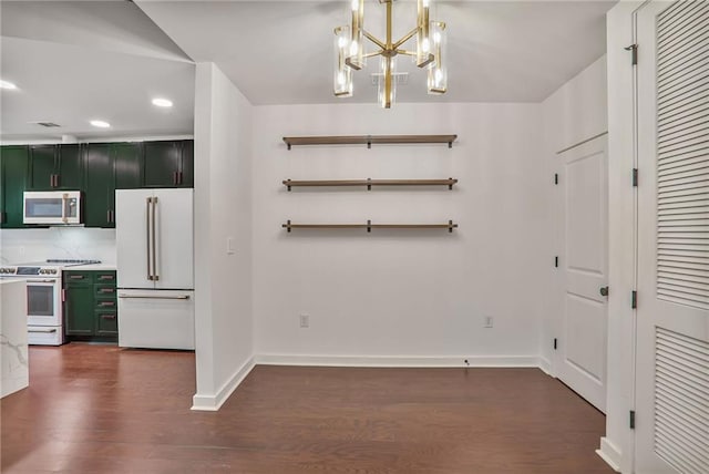 855 Peachtree St NE Unit 1108, Atlanta, GA 30308 - unfurnished dining area with dark wood-style flooring, a chandelier, and recessed lighting