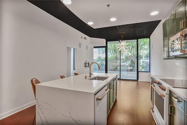 855 Peachtree St NE Unit 1108, Atlanta, GA 30308 - kitchen featuring white appliances, dark wood finished floors, green cabinets, and recessed lighting
