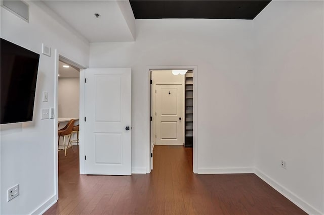 855 Peachtree St NE Unit 1108, Atlanta, GA 30308 - unfurnished bedroom featuring a spacious closet and wood finished floors
