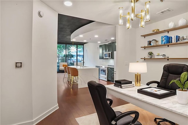 855 Peachtree St NE Unit 1108, Atlanta, GA 30308 - home office with dark wood-style flooring, recessed lighting, a chandelier, and floor to ceiling windows