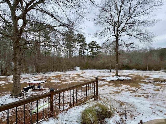 view of yard covered in snow