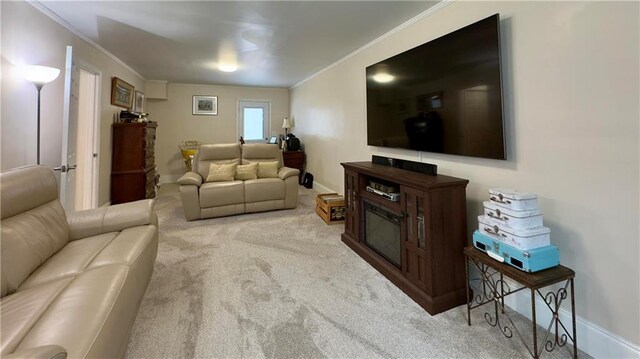 living room featuring carpet floors and ornamental molding