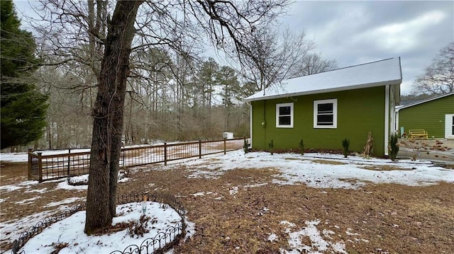 view of yard covered in snow