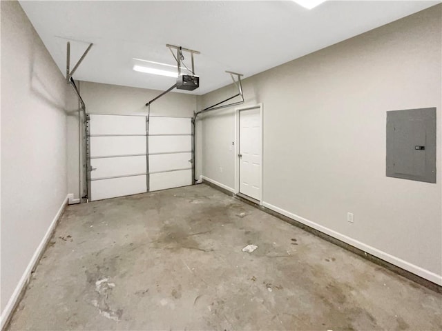 garage with electric panel, a garage door opener, and baseboards