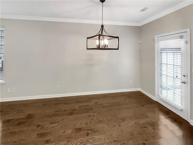 unfurnished dining area featuring a chandelier, visible vents, baseboards, and ornamental molding