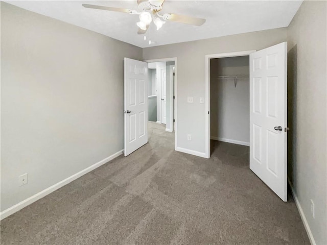 unfurnished bedroom featuring a closet, baseboards, a ceiling fan, and carpet flooring