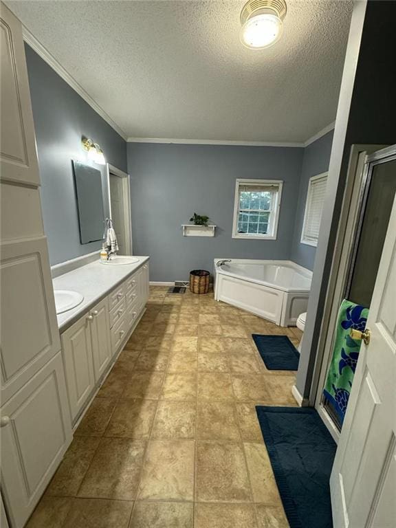 full bathroom featuring shower with separate bathtub, toilet, a textured ceiling, ornamental molding, and vanity