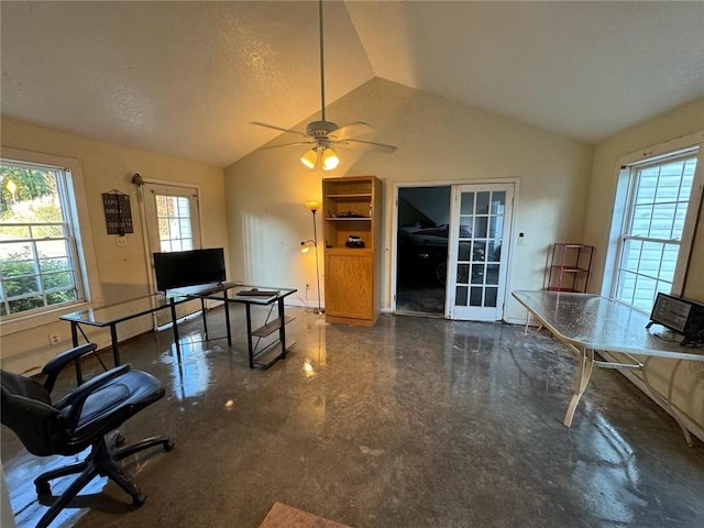 office area with ceiling fan, a textured ceiling, and lofted ceiling