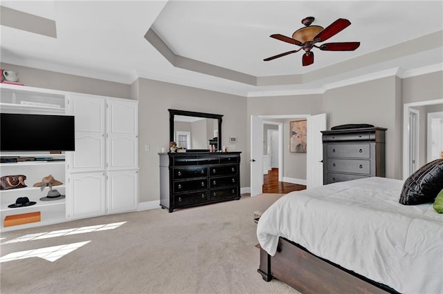 1313 Fallsbrook Ter NW, Acworth, GA 30101 - bedroom with a tray ceiling, light carpet, a ceiling fan, and crown molding