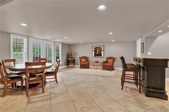 1313 Fallsbrook Ter NW, Acworth, GA 30101 - dining area featuring recessed lighting, light tile patterned floors, and french doors
