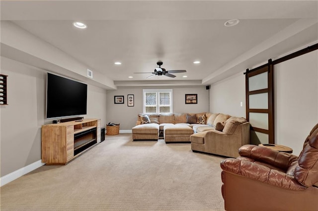 1313 Fallsbrook Ter NW, Acworth, GA 30101 - living room with recessed lighting, light carpet, a barn door, and a ceiling fan