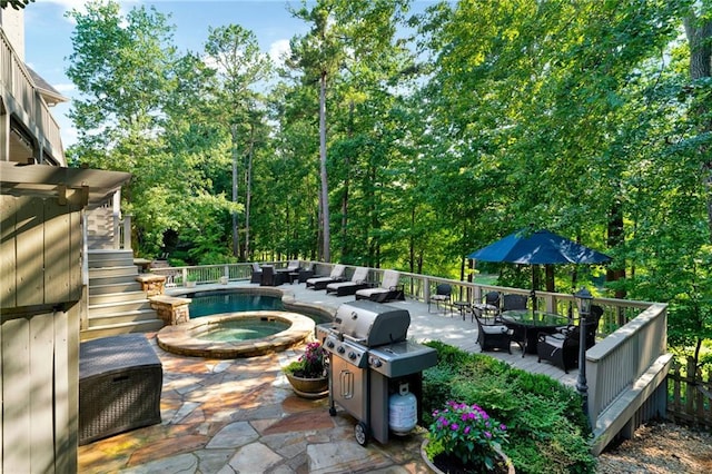 1313 Fallsbrook Ter NW, Acworth, GA 30101 - view of patio with an in-ground hot tub, an outdoor hangout area, stairs, grilling area, and a wooden deck