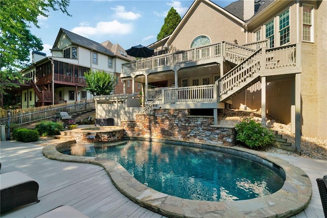 1313 Fallsbrook Ter NW, Acworth, GA 30101 - view of swimming pool with stairs, a deck, a pool with connected hot tub, and grilling area