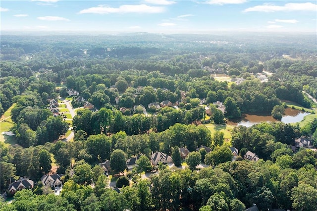 1313 Fallsbrook Ter NW, Acworth, GA 30101 - drone / aerial view of a heavily wooded area and a nearby body of water