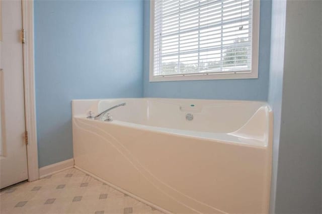 bathroom with a bathing tub