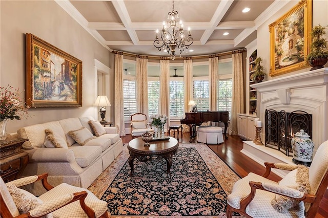 living area featuring hardwood / wood-style flooring, ornamental molding, coffered ceiling, and beam ceiling