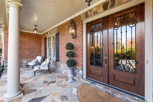 entrance to property with covered porch