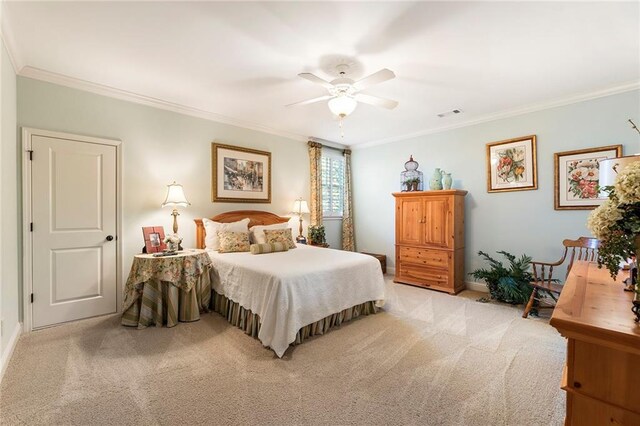 bedroom with light carpet, crown molding, and ceiling fan