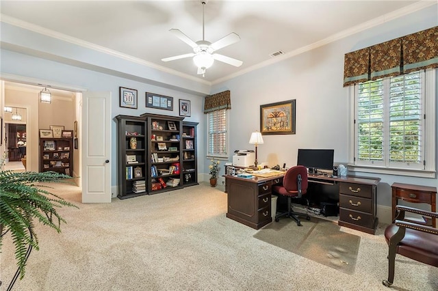 office space with crown molding, light colored carpet, and ceiling fan